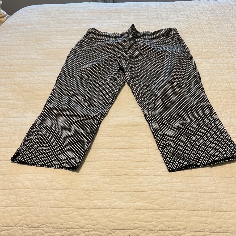 Stretch waistband black and white capris. Measure 17 across and 31 inch length